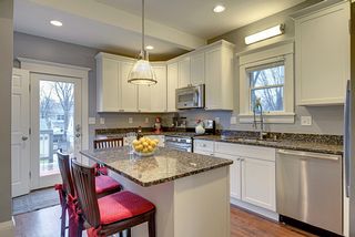 The Light-Filled Kitchen features a beautiful Center Island & Southern Exposure! 