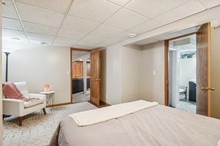 22. Lower level bedroom with ensuite bath