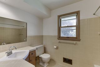 Wonderful bathroom with corner sink...