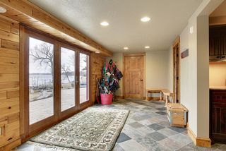 Come right in off the lake to enter the Locker area and lower Bath.