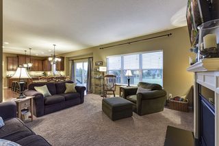 Tall windows (with blinds) allow in ample natural light
