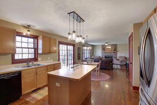 Kitchen window overlooks the large back yard with unobstructed views