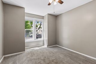 Sizable front bedroom with ceiling fan