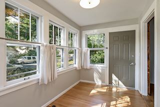 Sunroom looking toward front door