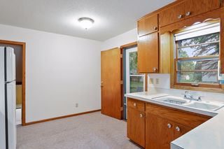 The "Eat-In Kitchen" features a walkout to the huge backyard 
and a 40x12 foot concrete Patio.