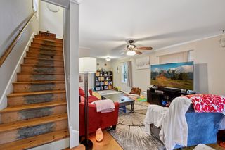 As you enter front door, living room and stairs to upper level.