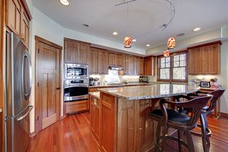 Stainless appliances throughout. Large walk-in pantry area.