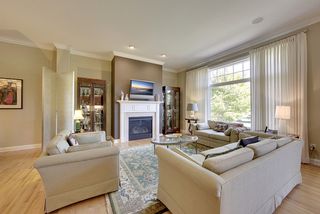 The gas fireplace with mantle and canned lighting provide a wonderful focal point for the room.
