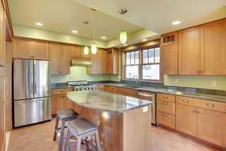 You'll LOVE the Custom Designed Kitchen with Center Island & In-Floor Heat...