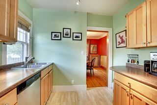 The Kitchen features Hardwood Floors & Stainless Steel Appliances...