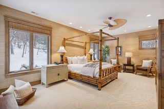 Second Lower Level En-Suite with Full Bath and Walk-In Closet.