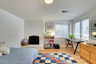 The Lower Level Bedroom features a Fireplace and Daylight Windows! Ideal for an Office or Family Room if needed?
