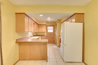 Newer refrigerator, dishwasher and disposal. 