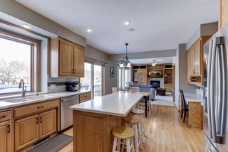 Large picture window overlooking back yard