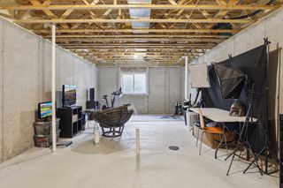 How would you finish this lower level space? 
 Notice the rough-in for a future fourth bath and daylight windows.