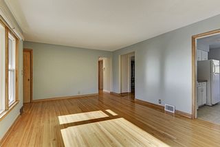The Living Room is flooded with Natural Light! Enjoy Western Sunset Views! 