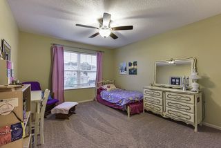 Bedroom #3 on the upper level with views of the front yard