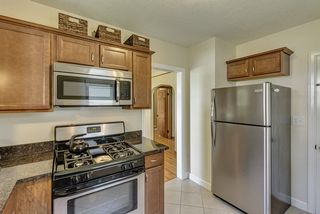 You will love the gas range and stainless appliances with granite countertops...