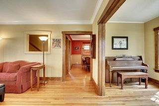 The Light-Filled Entry Hall offers a view of all Main Floor Living Areas.