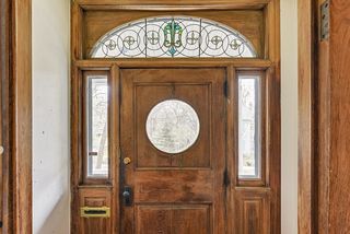 You will find an Original Stained Glass Window above the Front Door! 