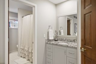view of the second bedroom and the tub/shower in between