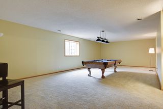 Partially finished basement with egress window.