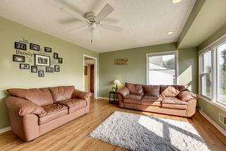 Another view of the living room just off of the kitchen and main floor bedrooms