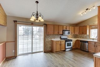 Large sliding glass doors leading out to the 2 tier deck