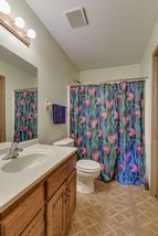 Bathroom with in-unit washer and dryer...