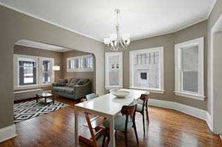 Dining room with living room to the left