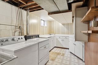 Lower Level Laundry Room with lots of storage and Utilities