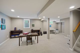 ...and leads to generous unfinished space for storage, laundry and another access to the back yard.