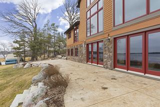 The colored concrete patio is serves as a perfect getaway for family and friends at sunset. 
