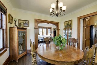 The Dining Room features Original Buffet & Arched Doorway...