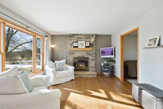 Gas stone fireplace in the family room