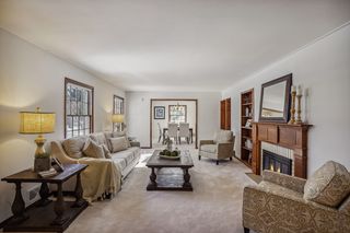 Living room with gas burning fireplace.
