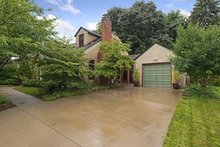 Enjoy the Mature Landscaping, beautiful Perennials & Attached One-Car Garage with Cement Driveway...