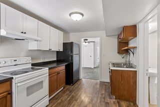 Upper unit kitchen looking towards front entrance