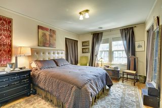 The spacious Master Bedroom features a wall of Custom Built-In's...