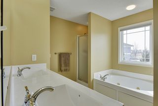 Master bath with jacuzzi tub and separate shower