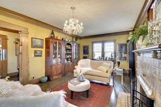 The Fireplace features Original Tile Detail...