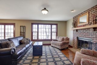 Warm and welcoming living room with wood fireplace