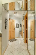 Entry Foyer with Mirrored Wall & Ceiling