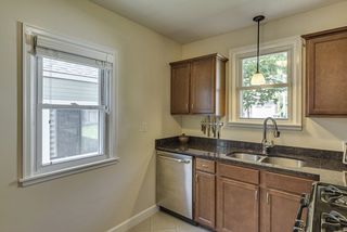Granite - stainless appliances - under counter sink - gas range...