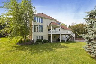 Large, mature pine trees are carefully located throughout the property. 