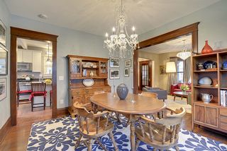 Entertain in style! The Formal Dining Room features Hardwood Floors & Elegant Crystal Chandelier! 