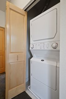 ...and stackable washer/dryer in Hall Closet