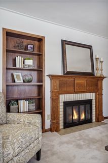 Incredible millwork around the gas fireplace.