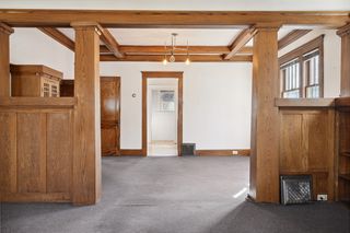 Original Wood Wainscot leading into Dining Room