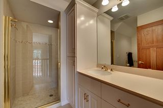 Upper bath, large walk in shower, separate tiled tub area. Heated ceramic floor.